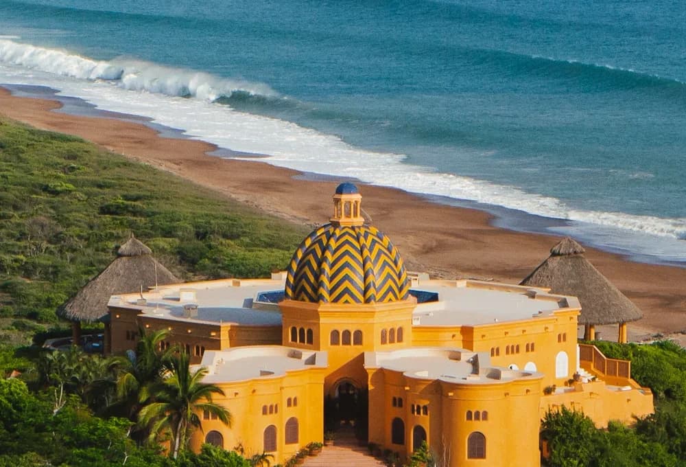 Casa Cuixmala, the domed main house of the Cuixmala luxury resort, set in jungle above the beach and the Pacific Ocean in Jalisco, Mexico